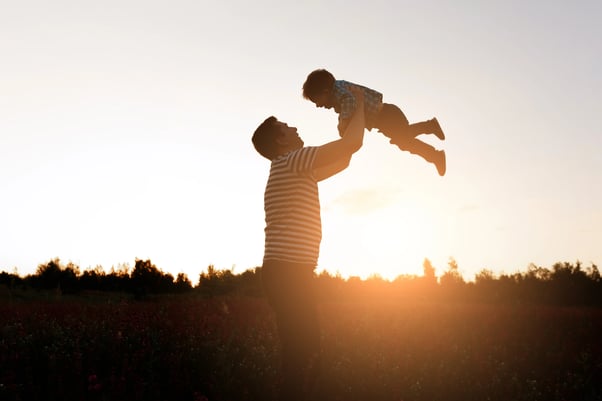 father-son-playing-park-sunset-time-happy-family-having-fun-outdoor